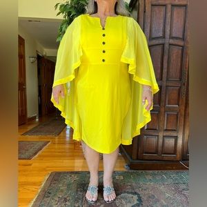 Brand new yellow dress with mesh details on shoulder